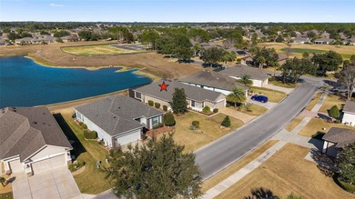 Discover this beautiful Shenandoah model overlooking priceless on Stone Creek Golf Club in Florida - for sale on GolfHomes.com, golf home, golf lot