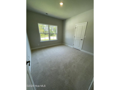 Check out this beautiful new construction home built by ADAMS on Carolina National Golf Club in North Carolina - for sale on GolfHomes.com, golf home, golf lot