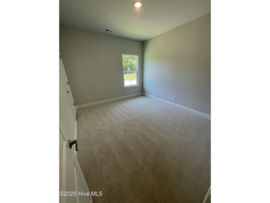 Check out this beautiful new construction home built by ADAMS on Carolina National Golf Club in North Carolina - for sale on GolfHomes.com, golf home, golf lot