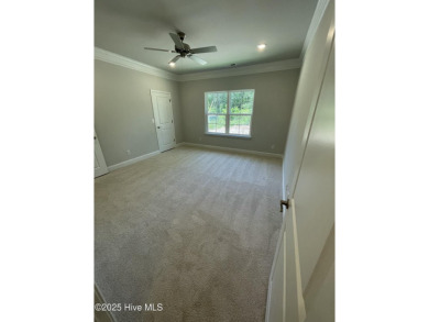 Check out this beautiful new construction home built by ADAMS on Carolina National Golf Club in North Carolina - for sale on GolfHomes.com, golf home, golf lot