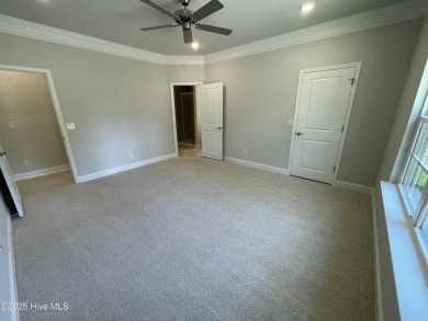 Check out this beautiful new construction home built by ADAMS on Carolina National Golf Club in North Carolina - for sale on GolfHomes.com, golf home, golf lot