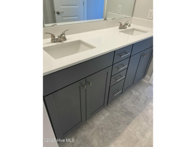 Check out this beautiful new construction home built by ADAMS on Carolina National Golf Club in North Carolina - for sale on GolfHomes.com, golf home, golf lot