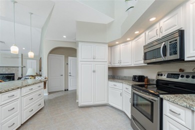 Stunning WATERFRONT pool home located on a quiet street in on Saint Andrews South Golf Club in Florida - for sale on GolfHomes.com, golf home, golf lot