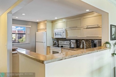 This beautifully updated 2/2 condo is located in a vibrant 55+ on Inverrary Country Club in Florida - for sale on GolfHomes.com, golf home, golf lot