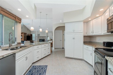 Stunning WATERFRONT pool home located on a quiet street in on Saint Andrews South Golf Club in Florida - for sale on GolfHomes.com, golf home, golf lot