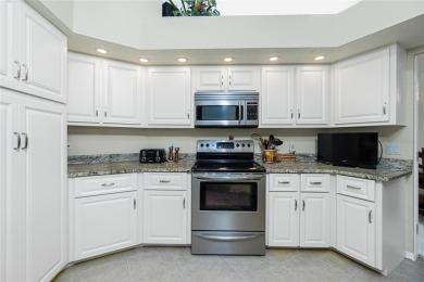 Stunning WATERFRONT pool home located on a quiet street in on Saint Andrews South Golf Club in Florida - for sale on GolfHomes.com, golf home, golf lot
