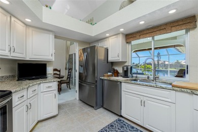 Stunning WATERFRONT pool home located on a quiet street in on Saint Andrews South Golf Club in Florida - for sale on GolfHomes.com, golf home, golf lot