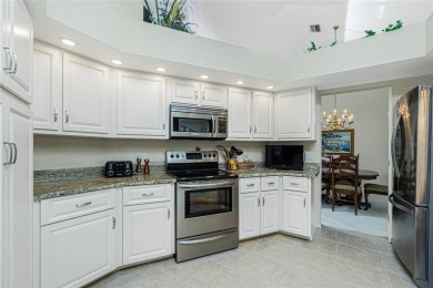 Stunning WATERFRONT pool home located on a quiet street in on Saint Andrews South Golf Club in Florida - for sale on GolfHomes.com, golf home, golf lot