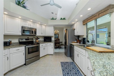 Stunning WATERFRONT pool home located on a quiet street in on Saint Andrews South Golf Club in Florida - for sale on GolfHomes.com, golf home, golf lot