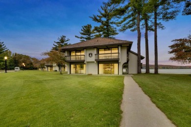 Welcome to this stunning 2-bedroom, 2-bathroom Deer Lake Villa on Boyne Mountain Resort - Monument Course in Michigan - for sale on GolfHomes.com, golf home, golf lot