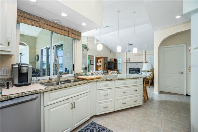 Stunning WATERFRONT pool home located on a quiet street in on Saint Andrews South Golf Club in Florida - for sale on GolfHomes.com, golf home, golf lot