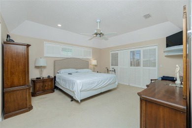 Stunning WATERFRONT pool home located on a quiet street in on Saint Andrews South Golf Club in Florida - for sale on GolfHomes.com, golf home, golf lot