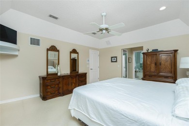 Stunning WATERFRONT pool home located on a quiet street in on Saint Andrews South Golf Club in Florida - for sale on GolfHomes.com, golf home, golf lot