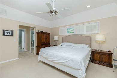 Stunning WATERFRONT pool home located on a quiet street in on Saint Andrews South Golf Club in Florida - for sale on GolfHomes.com, golf home, golf lot