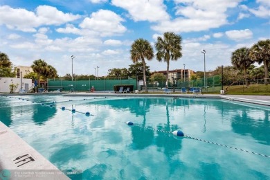This beautifully updated 2/2 condo is located in a vibrant 55+ on Inverrary Country Club in Florida - for sale on GolfHomes.com, golf home, golf lot