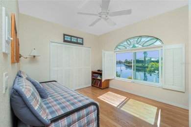 Stunning WATERFRONT pool home located on a quiet street in on Saint Andrews South Golf Club in Florida - for sale on GolfHomes.com, golf home, golf lot