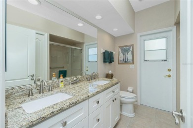 Stunning WATERFRONT pool home located on a quiet street in on Saint Andrews South Golf Club in Florida - for sale on GolfHomes.com, golf home, golf lot