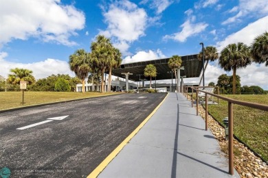 This beautifully updated 2/2 condo is located in a vibrant 55+ on Inverrary Country Club in Florida - for sale on GolfHomes.com, golf home, golf lot