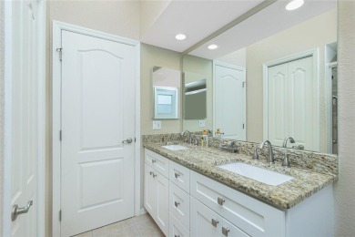 Stunning WATERFRONT pool home located on a quiet street in on Saint Andrews South Golf Club in Florida - for sale on GolfHomes.com, golf home, golf lot