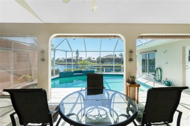 Stunning WATERFRONT pool home located on a quiet street in on Saint Andrews South Golf Club in Florida - for sale on GolfHomes.com, golf home, golf lot