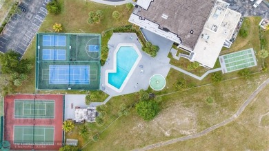 This beautifully updated 2/2 condo is located in a vibrant 55+ on Inverrary Country Club in Florida - for sale on GolfHomes.com, golf home, golf lot