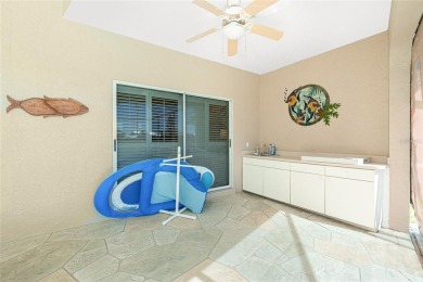 Stunning WATERFRONT pool home located on a quiet street in on Saint Andrews South Golf Club in Florida - for sale on GolfHomes.com, golf home, golf lot