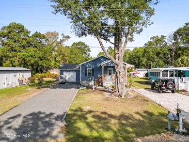 LOCATION IS EVERYTHING!!! This cute as can be home located in on Oyster Bay Golf Links in North Carolina - for sale on GolfHomes.com, golf home, golf lot