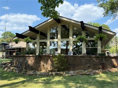 Charming Lakefront Home with Boat Dock & Stunning Sunsets
 on Lions Den Golf Club in Arkansas - for sale on GolfHomes.com, golf home, golf lot