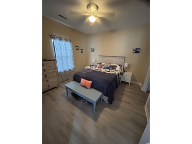 This warm and inviting 2-bedroom, 2-bathroom Condo features an on Palmetto Greens Golf and Country Club in South Carolina - for sale on GolfHomes.com, golf home, golf lot