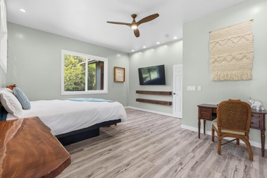 Lovingly built, this newer 3-bedroom, 2-bath custom home is on Volcano Golf and Country Club in Hawaii - for sale on GolfHomes.com, golf home, golf lot