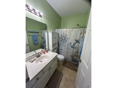 This warm and inviting 2-bedroom, 2-bathroom Condo features an on Palmetto Greens Golf and Country Club in South Carolina - for sale on GolfHomes.com, golf home, golf lot