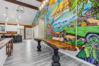 Lovingly built, this newer 3-bedroom, 2-bath custom home is on Volcano Golf and Country Club in Hawaii - for sale on GolfHomes.com, golf home, golf lot