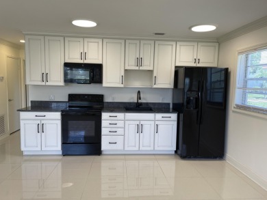 NEW NEW NEW -Completely renovated from floor to ceiling w/ best on Pine Lakes Golf Club in Florida - for sale on GolfHomes.com, golf home, golf lot