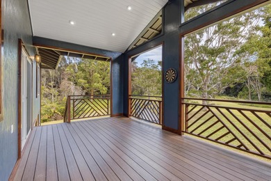 Lovingly built, this newer 3-bedroom, 2-bath custom home is on Volcano Golf and Country Club in Hawaii - for sale on GolfHomes.com, golf home, golf lot