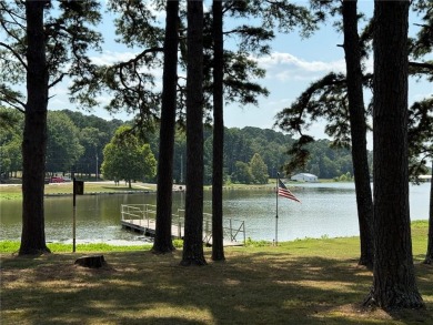 Charming Lakefront Home with Boat Dock & Stunning Sunsets
 on Lions Den Golf Club in Arkansas - for sale on GolfHomes.com, golf home, golf lot