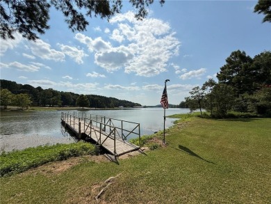Charming Lakefront Home with Boat Dock & Stunning Sunsets
 on Lions Den Golf Club in Arkansas - for sale on GolfHomes.com, golf home, golf lot