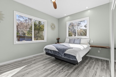 Lovingly built, this newer 3-bedroom, 2-bath custom home is on Volcano Golf and Country Club in Hawaii - for sale on GolfHomes.com, golf home, golf lot