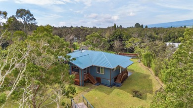 Lovingly built, this newer 3-bedroom, 2-bath custom home is on Volcano Golf and Country Club in Hawaii - for sale on GolfHomes.com, golf home, golf lot