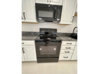NEW NEW NEW -Completely renovated from floor to ceiling w/ best on Pine Lakes Golf Club in Florida - for sale on GolfHomes.com, golf home, golf lot