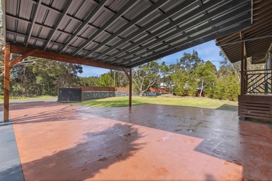 Lovingly built, this newer 3-bedroom, 2-bath custom home is on Volcano Golf and Country Club in Hawaii - for sale on GolfHomes.com, golf home, golf lot