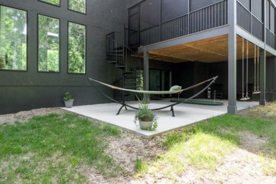 Escape to your own private paradise nestled in a tranquil wooded on Hyperion Field Club in Iowa - for sale on GolfHomes.com, golf home, golf lot