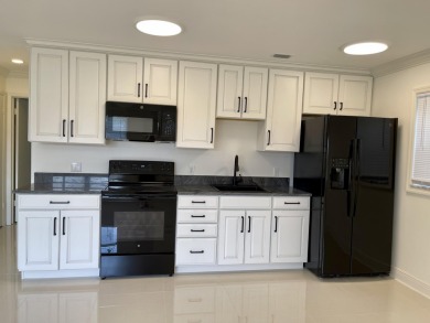 NEW NEW NEW -Completely renovated from floor to ceiling w/ best on Pine Lakes Golf Club in Florida - for sale on GolfHomes.com, golf home, golf lot