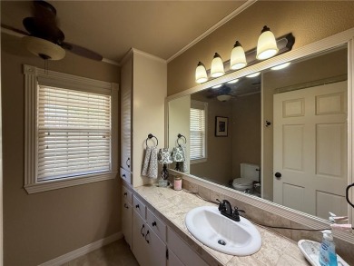 Charming Lakefront Home with Boat Dock & Stunning Sunsets
 on Lions Den Golf Club in Arkansas - for sale on GolfHomes.com, golf home, golf lot