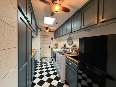 Charming Lakefront Home with Boat Dock & Stunning Sunsets
 on Lions Den Golf Club in Arkansas - for sale on GolfHomes.com, golf home, golf lot