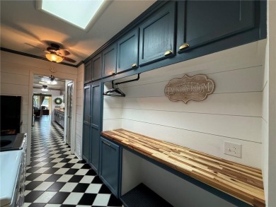 Charming Lakefront Home with Boat Dock & Stunning Sunsets
 on Lions Den Golf Club in Arkansas - for sale on GolfHomes.com, golf home, golf lot