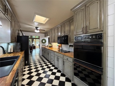 Charming Lakefront Home with Boat Dock & Stunning Sunsets
 on Lions Den Golf Club in Arkansas - for sale on GolfHomes.com, golf home, golf lot