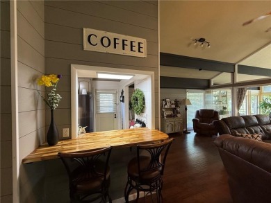 Charming Lakefront Home with Boat Dock & Stunning Sunsets
 on Lions Den Golf Club in Arkansas - for sale on GolfHomes.com, golf home, golf lot