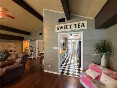 Charming Lakefront Home with Boat Dock & Stunning Sunsets
 on Lions Den Golf Club in Arkansas - for sale on GolfHomes.com, golf home, golf lot