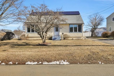 Nestled just three blocks from Short Beach, this charming Cape on Short Beach Golf Course in Connecticut - for sale on GolfHomes.com, golf home, golf lot