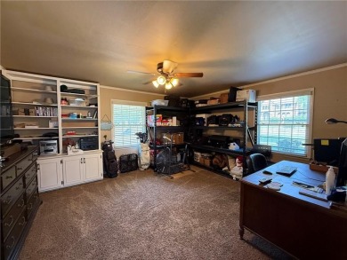 Charming Lakefront Home with Boat Dock & Stunning Sunsets
 on Lions Den Golf Club in Arkansas - for sale on GolfHomes.com, golf home, golf lot